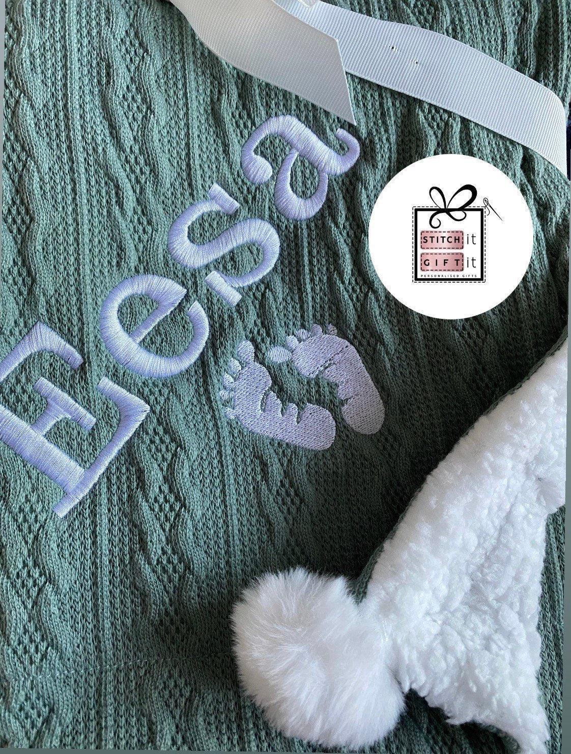 Footprints cable knit baby pom pom sherpa blanket